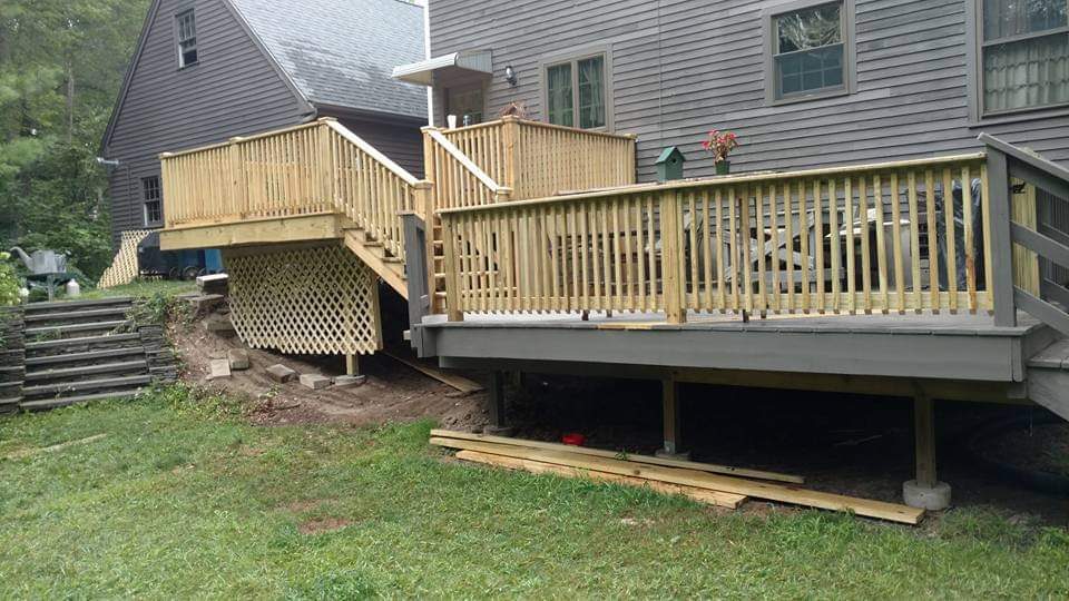 After — completed wood deck and railing in Sutton, MA After — completed wood deck and railing in Sutton, MA