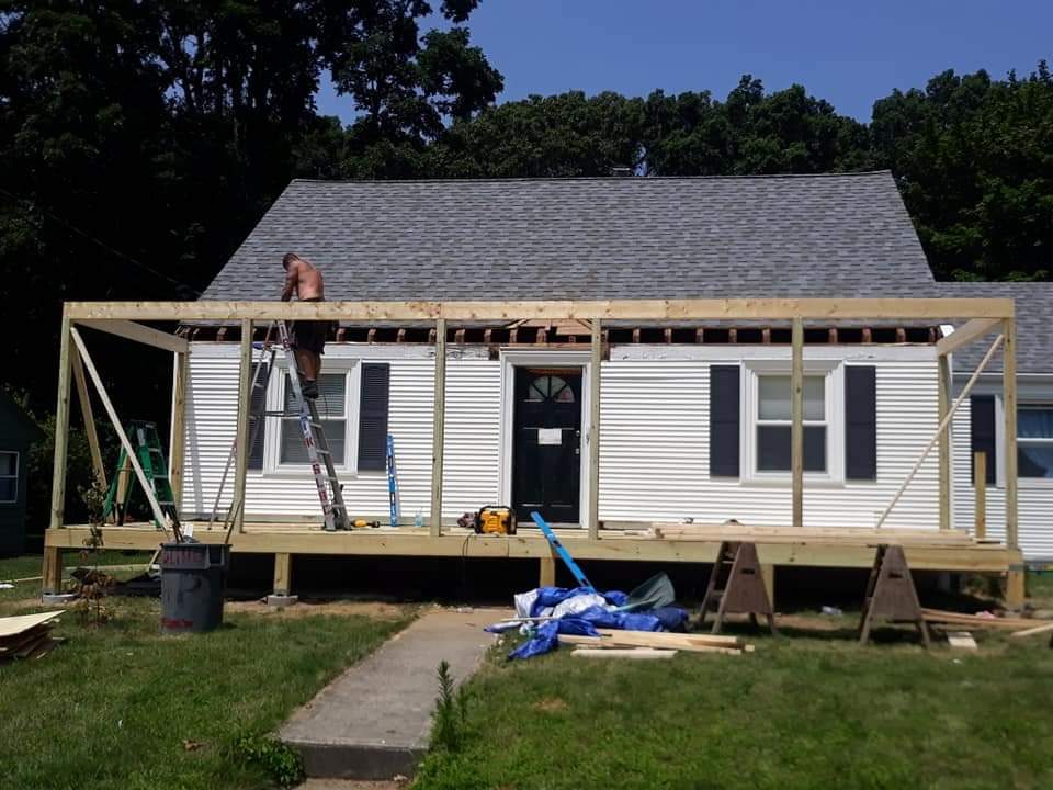 Before — front porch timber frame during deck building in Sutton, MA Before — front porch timber frame during deck building in Sutton, MA