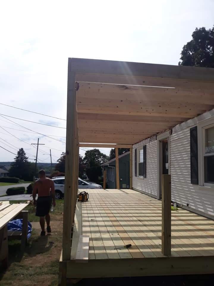 Before — porch floor joists during deck construction in Worcester County, MA Before — porch floor joists during deck construction in Worcester County, MA