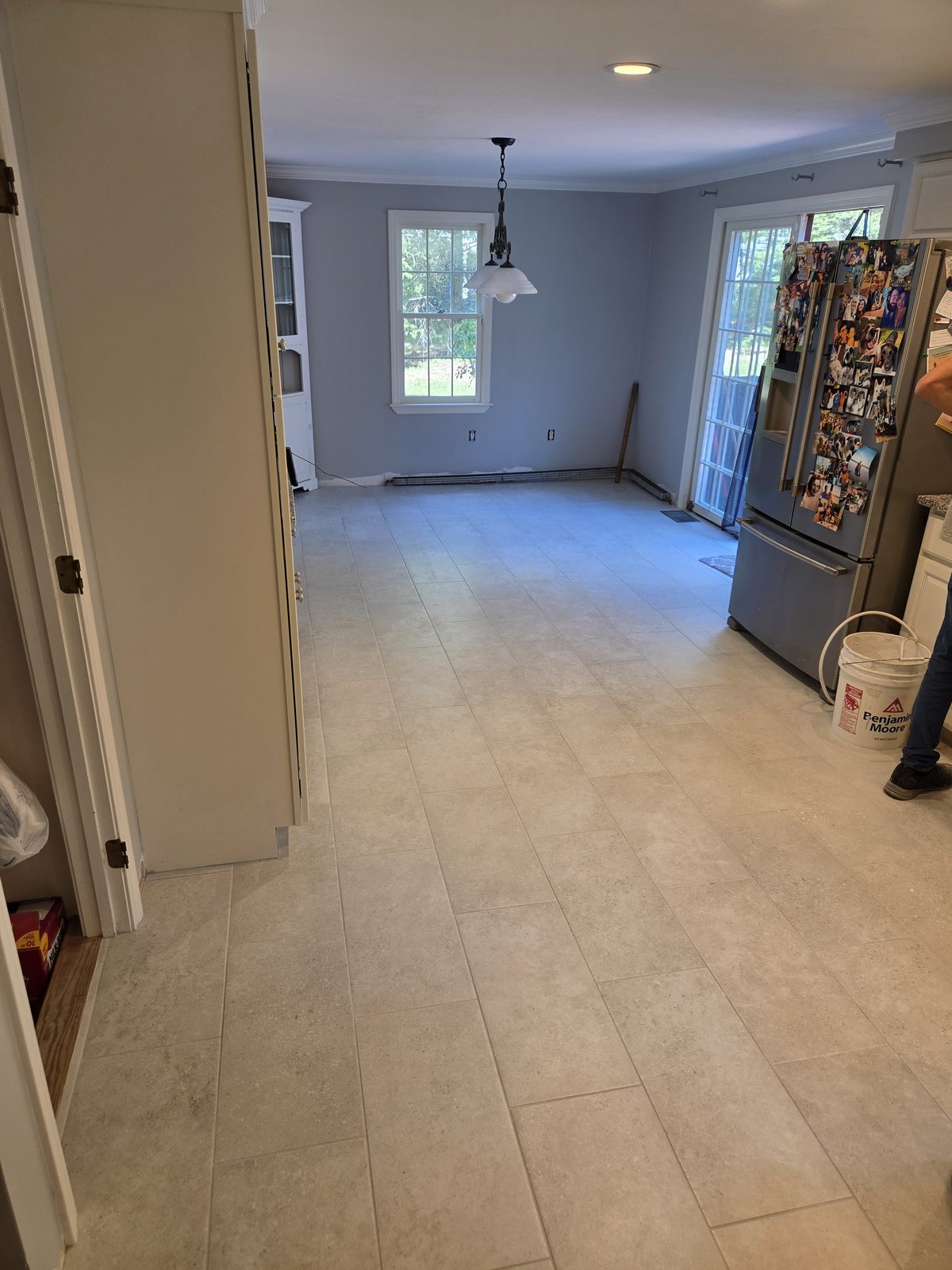 After — new tile flooring in a Sutton, MA kitchen and dining area After — new tile flooring in a Sutton, MA kitchen and dining area