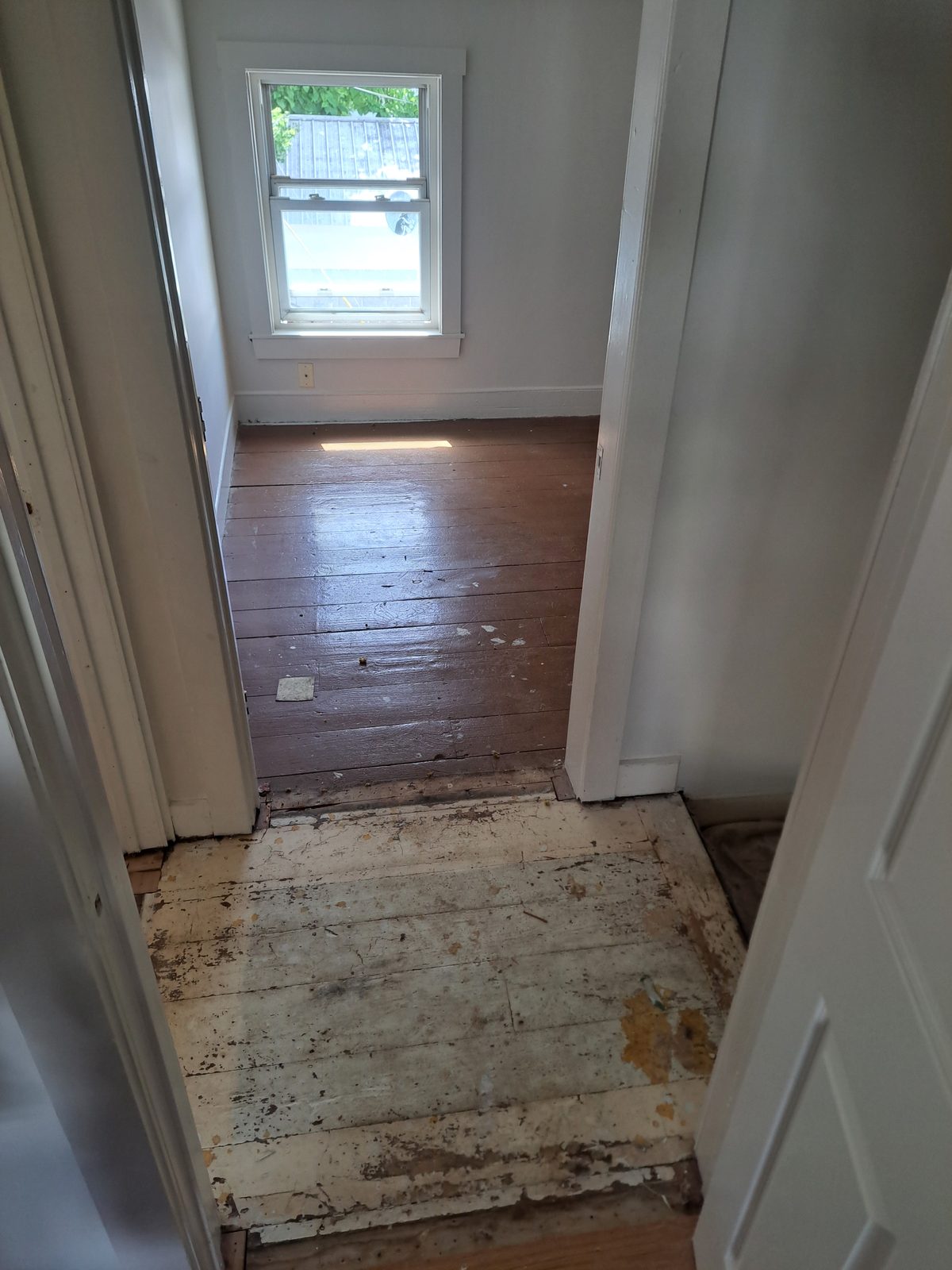 Before — worn painted wood floors prior to floor work in Sutton, MA Before — worn painted wood floors prior to floor work in Sutton, MA