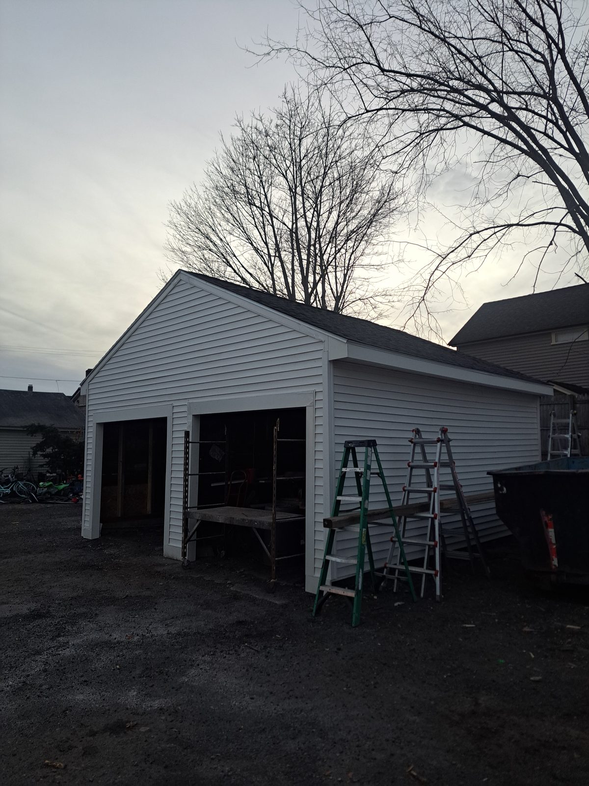 After — two-bay garage with new siding in Sutton, MA After — two-bay garage with new siding in Sutton, MA