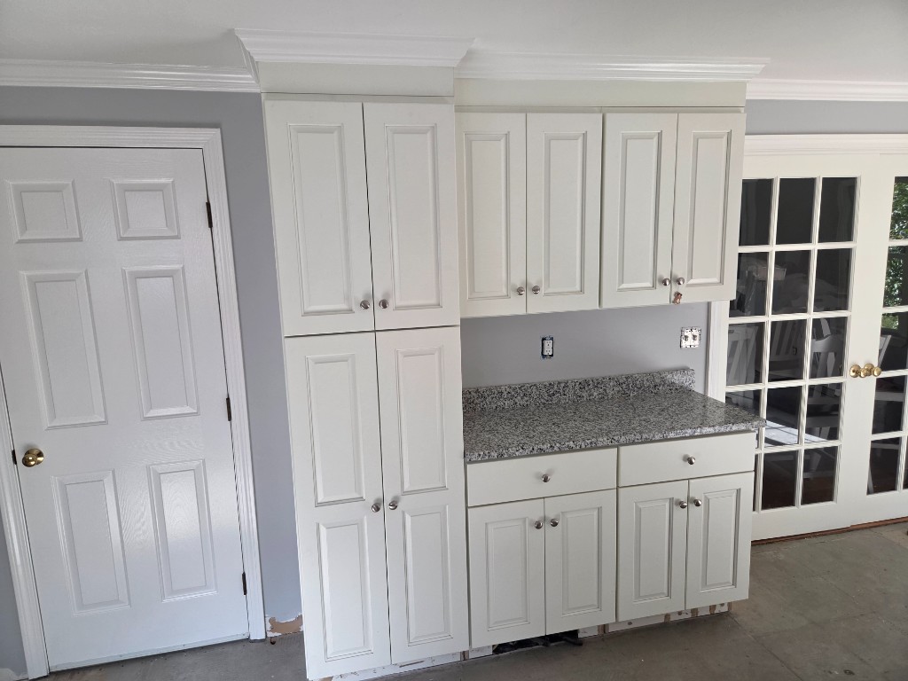 After — white kitchen cabinets and granite counter in a Sutton, MA kitchen remodel After — white kitchen cabinets and granite counter in a Sutton, MA kitchen remodel