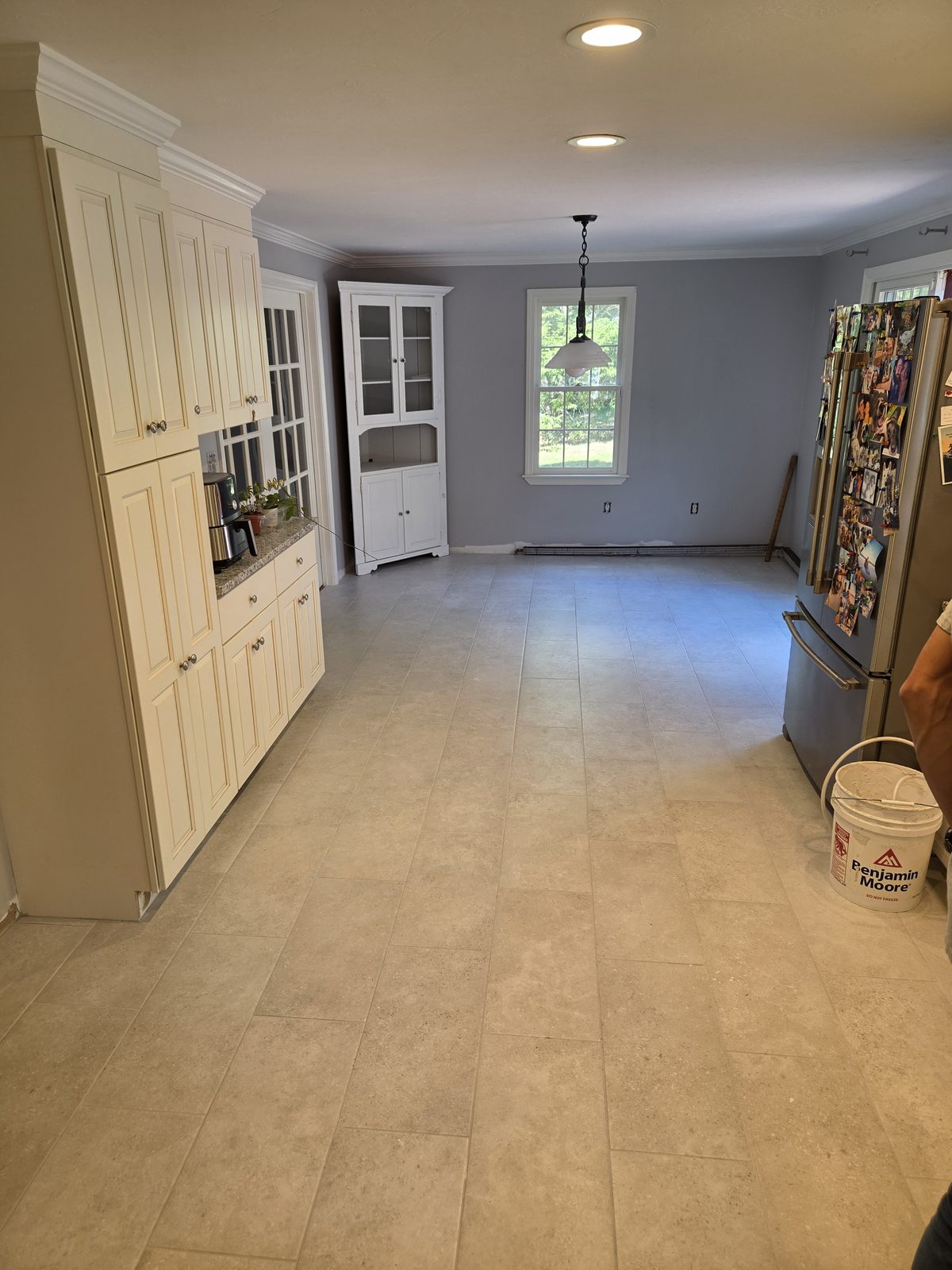 After — pantry cabinets and new tile flooring in a Sutton, MA kitchen After — pantry cabinets and new tile flooring in a Sutton, MA kitchen