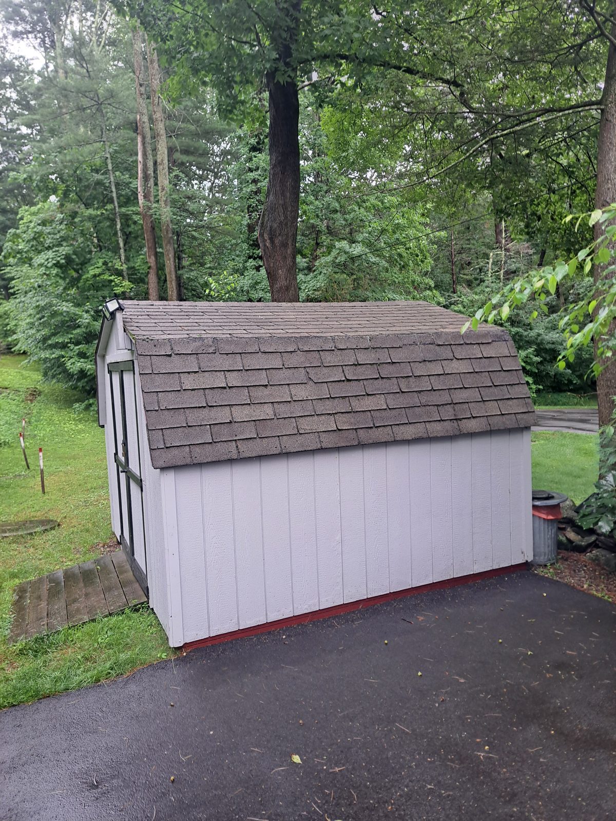 Before — white gable shed before siding and roofing in Sutton, MA Before — white gable shed before siding and roofing in Sutton, MA