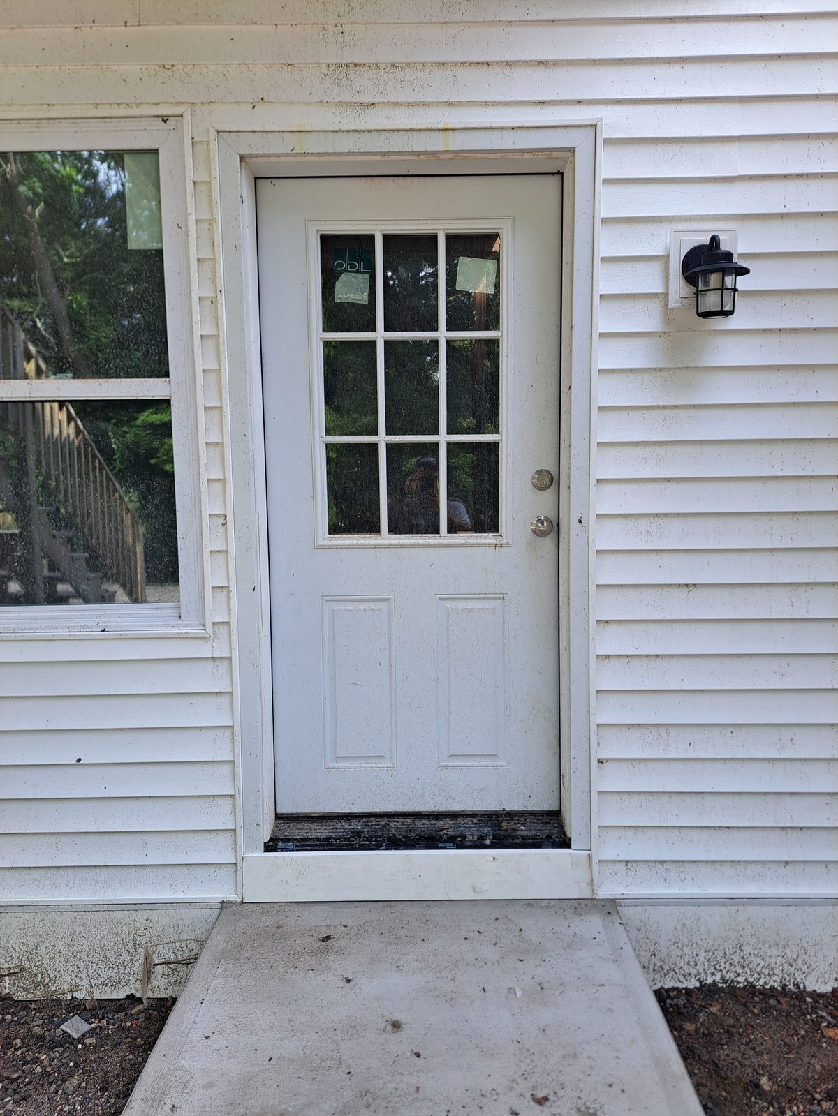 After — vinyl siding around an entry door in Sutton, MA After — vinyl siding around an entry door in Sutton, MA