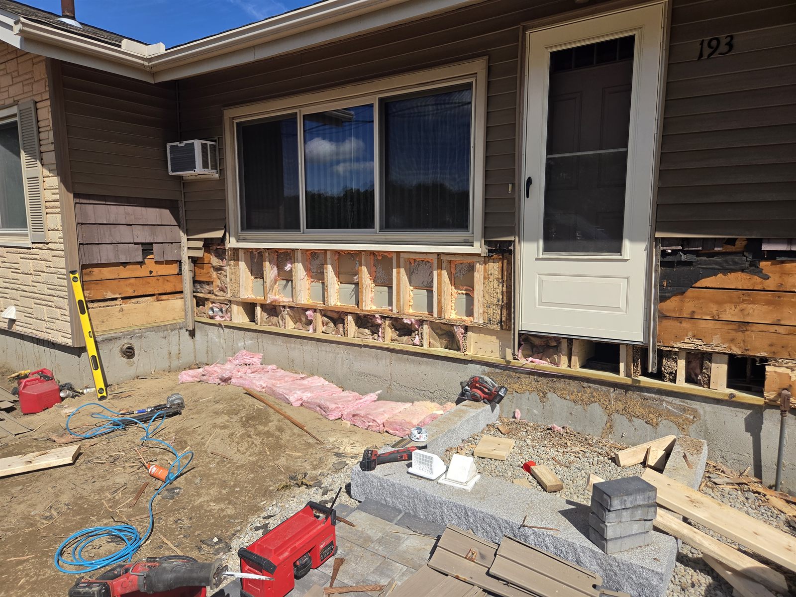 Before — wall framing under a window during siding repair in Sutton, MA Before — wall framing under a window during siding repair in Sutton, MA