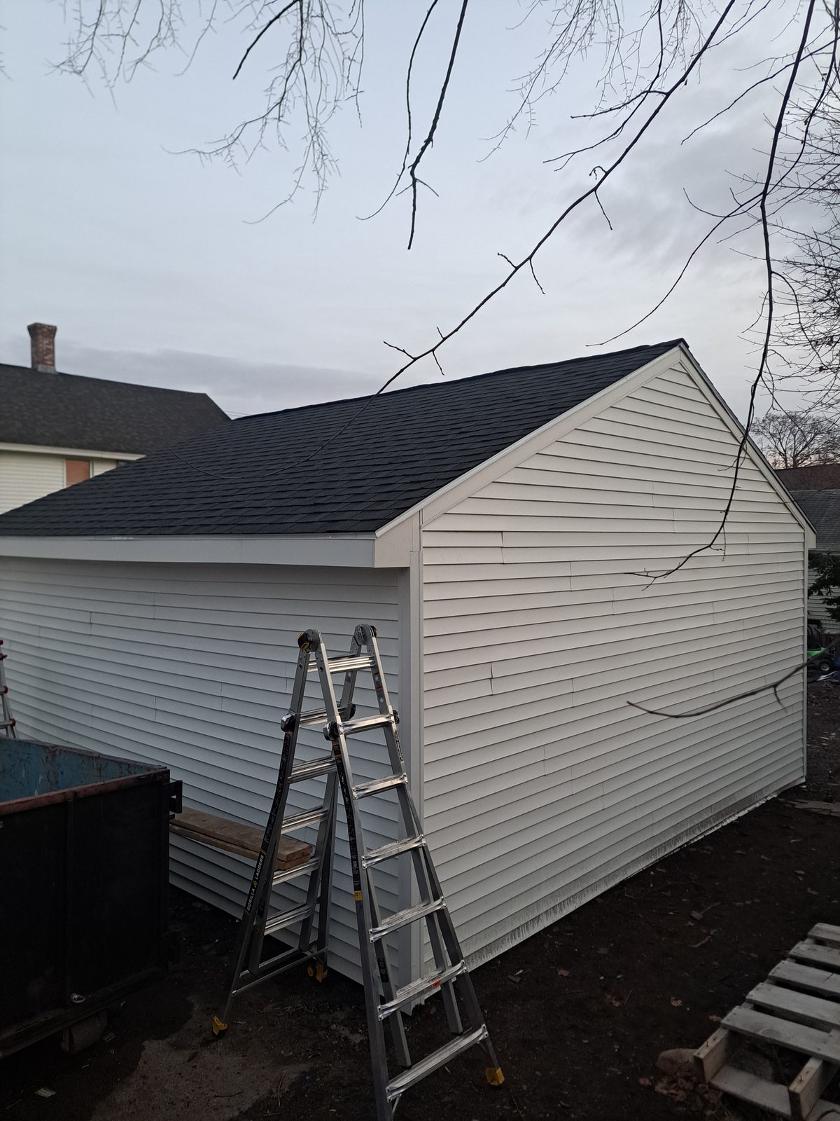 After — completed garage siding and shingle roof in Worcester County, MA After — completed garage siding and shingle roof in Worcester County, MA