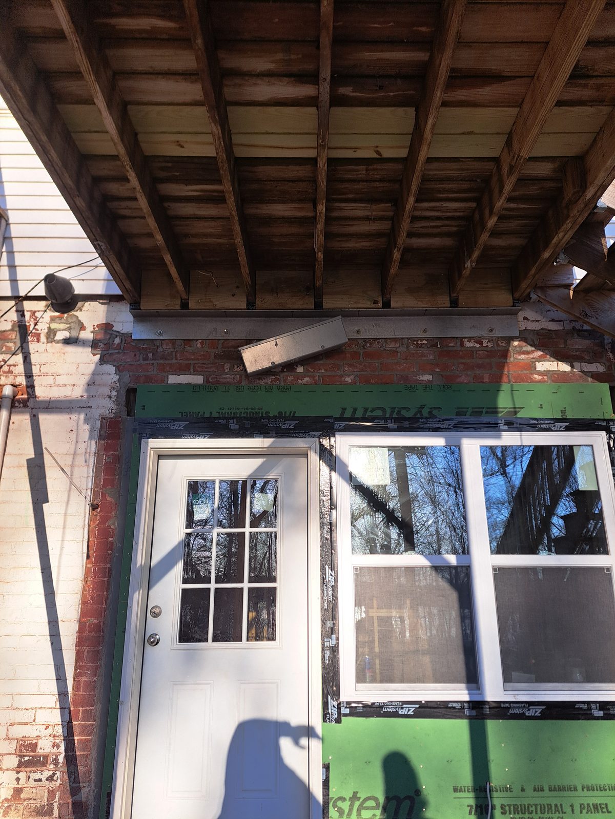 Before — window set in Zip System sheathing by general contractor Sutton, MA Before — window set in Zip System sheathing by general contractor Sutton, MA