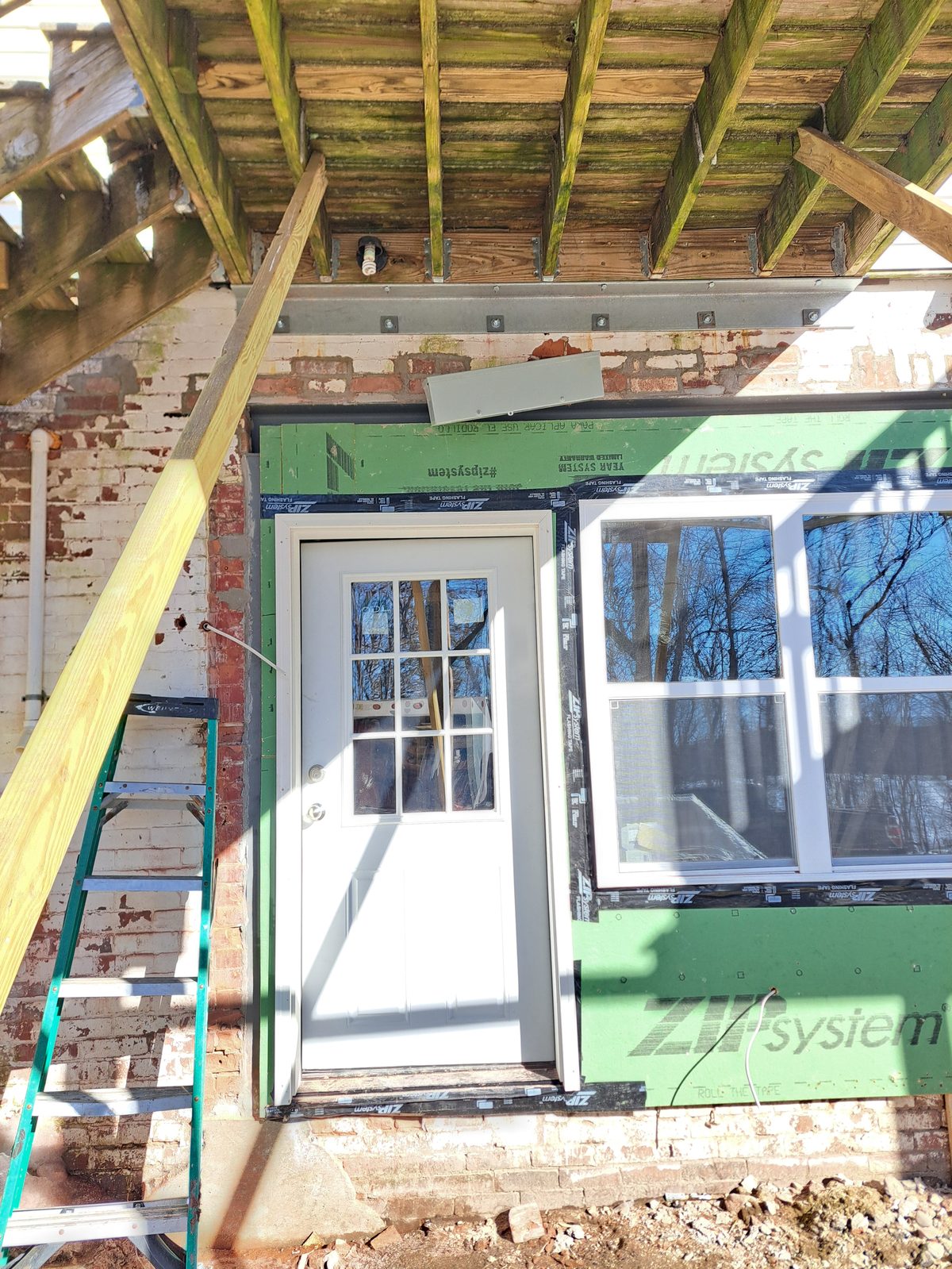 Before — exterior window installation with house wrap in Worcester County, MA Before — exterior window installation with house wrap in Worcester County, MA